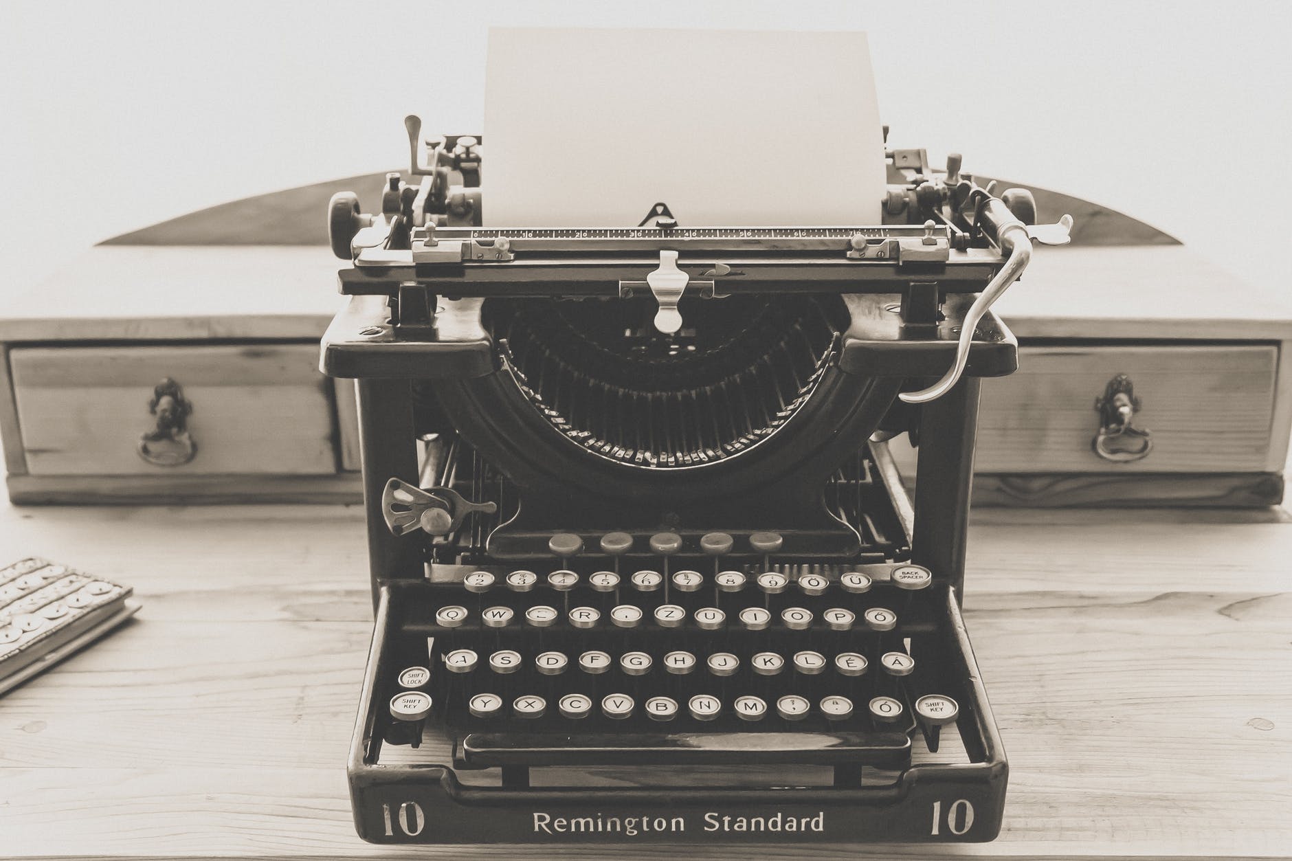 remington standard typewriter in greyscale photography